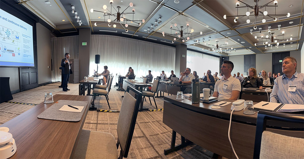 Aptos CTO Tushar Sachdev speaks to Engage Direct Denver attendees about recent innovations.